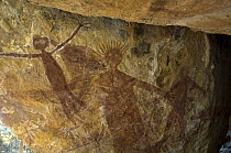 Quinkan-style Aboriginal rock art at the Honeymoon Aboriginal Rock Art Shelter, Jowabinna Rock Art Safari Camp, Cape York, Queensland, Australia