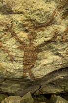 Quinkan-style Aboriginal rock art at the HOneymoon Aboriginal Rock Art Shelter, Jowabinna Rock Art Safari Camp, Cape York, Queensland, Australia .