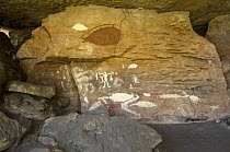 Quinkan-style Aboriginal rock art at the Mona Lisa Aboriginal Rock Art Shelter, Jowabinna Rock Art Safari Camp, Cape York, Queensland, Australia