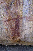 Quinkan-style Aboriginal rock art at the Mona Lisa Aboriginal Rock Art Shelter, Jowabinna Rock Art Safari Camp, Cape York, Queensland, Australia.