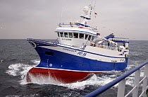 MFV "Harvester" coming alongside partner vessel to start pair trawling operations. North Sea, September 2008. Property Released.