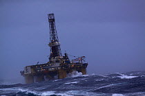 Oil drilling rig "John Shaw", situated at the Don oilfield 240 miles North East of Aberdeen, in heavy seas. North Sea, 2009.