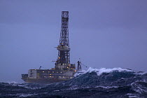 Oil drilling rig ^John Shaw^, situated at the Don oilfield 240 miles North East of Aberdeen, in heavy seas. North Sea, 2009.