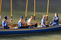 "Isambard" crew raising their oars, celebrating winning the mixed heat of the "Bristol Challenge" race along the Avon Gorge, March 21st 2009.