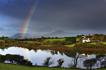 Dawn over Bantry Bay with rainbow, nr Bantry, County Cork, Republic of Ireland, October 2008