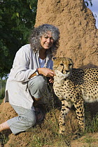 Dr. Laurie Marker and Kanini (an orphan female cheetah being raised by Dr. Marker and used as an educational ambassador) Cheetah Conservation Fund, Namibia, captive