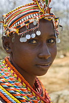 Young Samburu woman wearing traditional bead jewellery, Namunyak Conservancy, Northern Rangelands Trust, Kenya *No model release available - for editorial use only