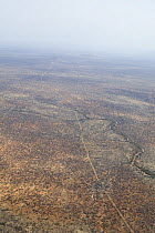 Aerial view of the border of a conservancy area in northern Kenya, created by manpower, showing Kenyan comittment to conservancy