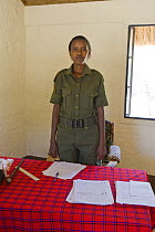Park ranger in her office at Headquarters of the West Gate Conservancy, Northern Rangelands Trust, Kenya *No model release available - for editorial use only