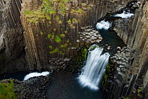 Litlanesfoss waterfall, Hengifoss river, basalt lava solidified in hexagonal columns, Iceland, August 2008.