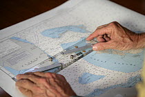 Navigating with paper charts aboard Amel 54 ketch "Hollis" on delivery from Martinique, Caribbean. 2006.