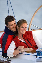 Couple on yacht "Sabre Spirit" sailing off Portland, Maine. Model and property released, 2007.