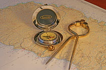 Compass and dividers aboard cruising yacht.