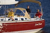 Family cruising on Tartan 3700 yacht "Second Passion", Severn River near Annapolis, Maryland. Model and property released, October 2007.