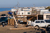 Arles beach covered with tourist caravans and cars, Camargue, France, May 2008