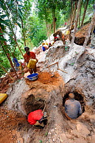 Miners working in an artisanal coltan open-pit mine, Muhanga coltan mines, Rwanda, Africa, March 2009