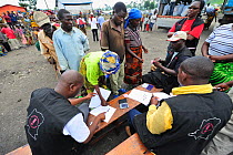 People registering for food aid distributed at refugee camp Mugunga 1, west of Goma, North Kivu, Democratic Republic of Congo, Africa, March 2009