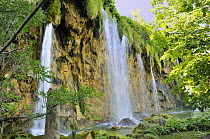 Waterfalls in Plitvice Lakes National Park, Croatia, where travertine forms as moss becomes coated in lime.