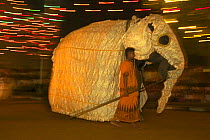 Dressed Asian elephant and dancer at the Perehera religous elephant festival, Sri Lanka