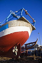 Stern of trawler under construction in boatyard, Essaouira, Morocco. November 2008.