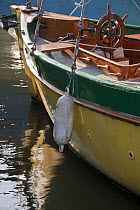 Fender on wooden sailing yacht, Underfall Yard, Bristol, UK. April 2009.