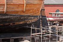 Scaffolding to repair planking on Replica of John Cabot's caravel "The Matthew", undergoing maintenance at Underfall Yard in Bristol's Floating Harbour, UK. April 2009.