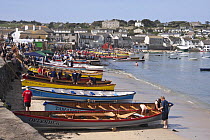 Cornish Pilot Gigs pulled up on Town Beach, St. Mary's, Isles of Scilly. World Pilot Gig Championships, May 2009.