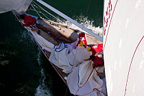 Crew on 68ft Swan "Chippewa" dropping the spinnaker, Newport Bucket Regatta, July 2009, Rhode Island, USA.