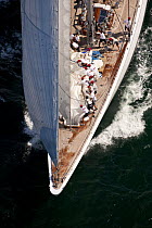 Crew lowering spinnaker on J-Class yacht "Ranger", Newport Bucket Regatta, July 2009, Rhode Island, USA.