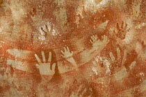 Aboriginal rock art with many human hands, at a site called "The Art Gallery", Carnarvon Gorge, Carnarvon National Park, Queensland, Australia