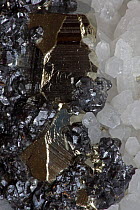 Sphalerite (dark color), Pyrite (golden color) and Quartz (white color) crystals, Peru, South America