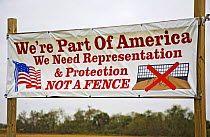 Sign protesting against the US / Mexico border wall, Lower Rio Grande Valley wildlife corridor, Texas, USA ILCP RAVE January/February 2009