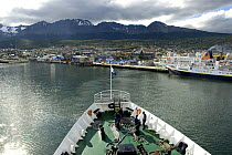 Ushuaia Port seen from a ship, the most southern city in the world, the point of departure for cruise ships and yachts leaving for the Antarctic Peninsula, Tierra del Fuego, Patagonia, Argentina, Janu...