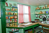 Museum and Antarctic souvenir shop, showing a kitchen with tinned food, Port Lockroy, Goudier Island, Antarctic Peninsula, Antarctica,