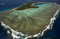 Aerial view of fringing reef off a Fiji island, Melanesia, Pacific, September 2007