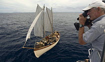 BBC cameraman filming a re-enactment of the Whaleboat drama following the sinking of the Whaleship Essex by Sperm whales in the South pacific in 1820. February 2008