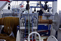 Nets on winches on deck of fishing vessel "Harvester", with her sister ship "Ocean Harvest" beside. North Sea, August 2008.  Property Released.