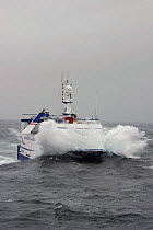 Fishing vessel "Harvester" punching through a wave, North Sea, August 2008.  Property Released.