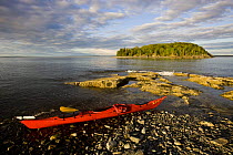 Kayak on shore, Porcupine Islands, Acadia National Park, Maine, USA. Model Released. June 2008