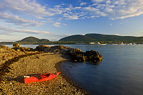 Kayak on shore, Porcupine Islands, Acadia National Park, Maine, USA. Model Released. June 2008