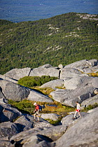 Hikers near the summit of Mount Monadnock, Monadnock State Park, New Hampshire, USA, August 2008