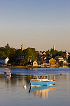 Lobster boat moored in the mouth of the Piscataqua River in the South End, Portsmouth, New Hampshire, USA. May 2008