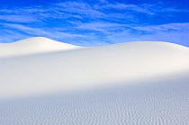White sand dunes against blue sky, White Sands National Park, New Mexico, USA, February 2009