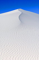 White sand dunes against blue sky, White Sands National Park, New Mexico, USA, February 2009