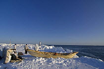 An Inupiaq whaling crew waits at the edge of an open lead in the pack ice for passing Bowhead whales during spring whaling season, off the Arctic coastal village of Point Hope, Chukchi Sea, Alaska, Ma...