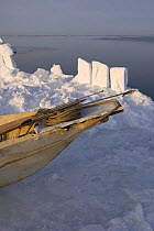 An Inupiaq seal skin boat / umiak at the edge of an open lead in the pack ice during spring whaling season, off the Arctic coastal village of Point Hope, Chukchi Sea, Alaska, May 2008