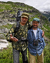 Guide and Park ranger, Zaur Amatovich Takhtiec (left) with guide and ornithologist, Vladimir Yu. Archipov, near Dombay, Teberdinsky biosphere reserve, Caucasus, Russia, July 2008 (Model released)