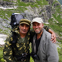 Guide and park ranger, Zaur Amatovich Takhtiev,  with photographer, Tom Schandy (right) Alibek Valley near Dombay, Teberdinsky biosphere reserve, Caucasus, Russia, July 2008 (Model released)