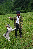 Park ranger, Seibe Janibekov, and his dog in the Arkhyz valley, the western part of the Teberdinsky Biosphere reserve, Caucasus, Russia, July 2008