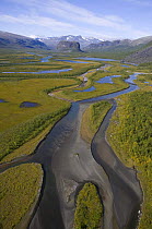 Aerial view over Laitaure delta in the Rapadalen valley with Skierffe and Nammatj mountains, Sarek National Park, Laponia World Heritage Site, Lapland, Sweden, September 2008.